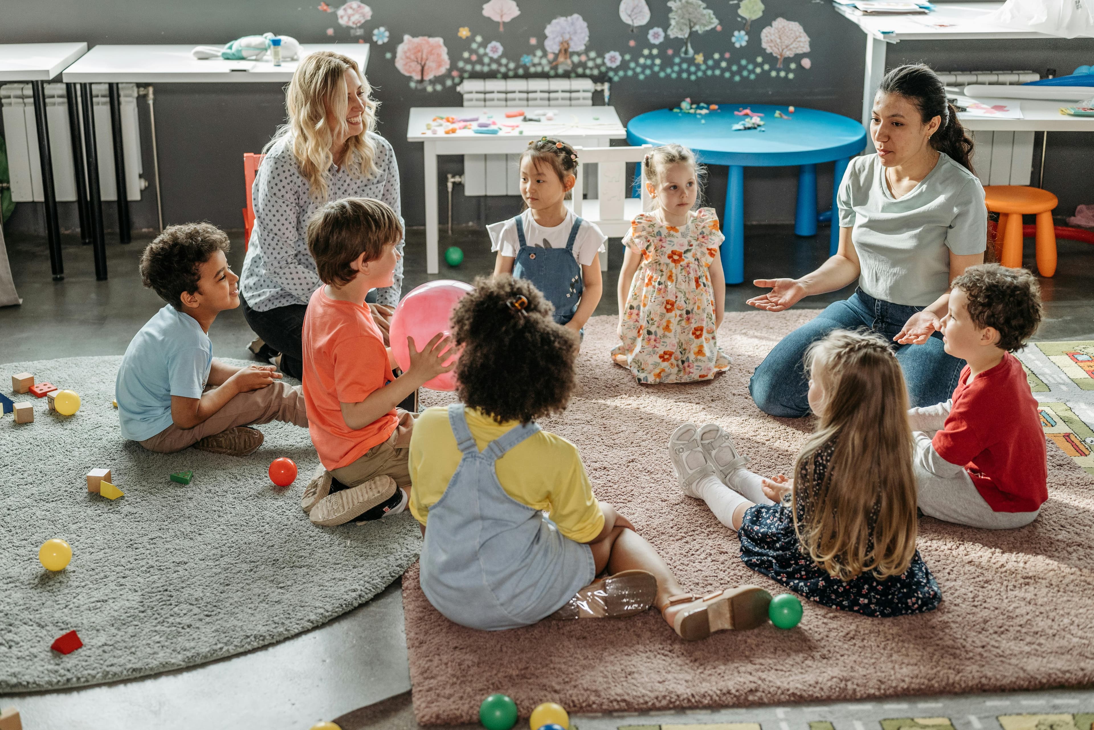 Children in a bright nursery classroom